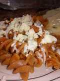 Fusilli entomatado con queso