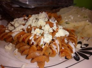 Una foto de Fusilli entomatado con queso