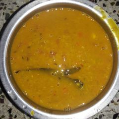 A picture of Moong daal with green peas.