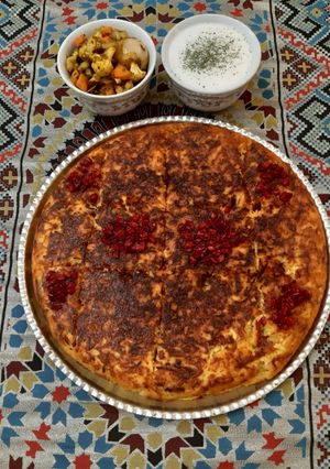 عکسی از دستور ته چین مرغ ریش ریش شده