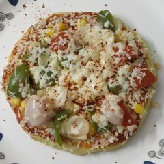 A picture of Yummy sooji pizza.