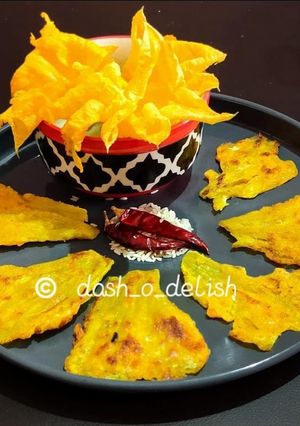 A picture of ODIA KAKHARU PHULA PITHA / PUMPKIN FLOWER FRITTERS.