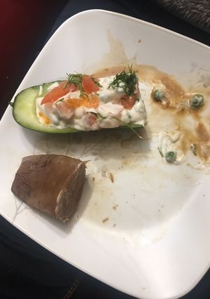 A picture of Chicken tzatziki cucumber boats.