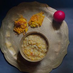 A picture of Alu Bokhara or Plum Khichuri.
