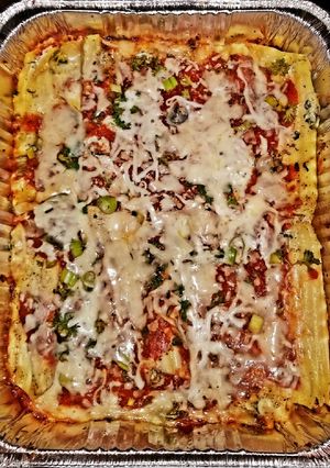 A picture of Mike's Extra Cheesy Crazy Pleasy Manicotti.