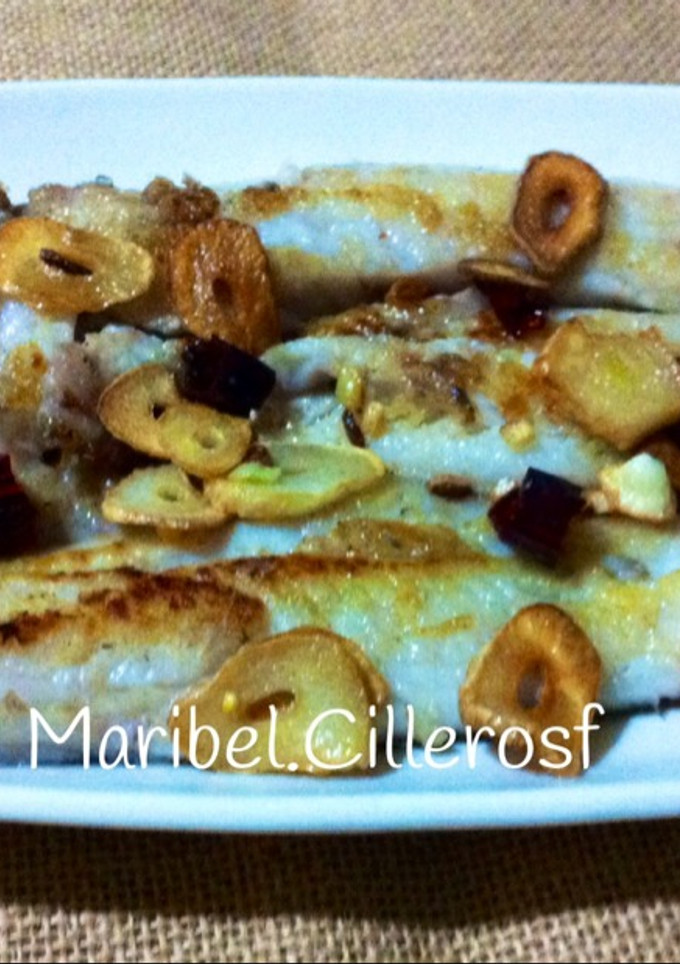 Una foto de Filetes de merluza con fritada Bilbaína