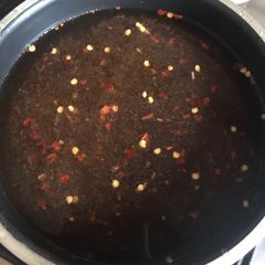 A picture of Tamarind and dry plums chatni (sweet and spices and sour) taste.