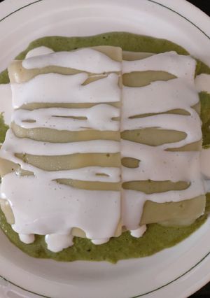 A picture of Chicken Enchiladas in Poblano Chile Sauce.