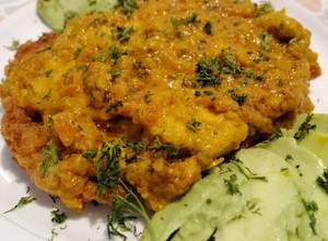 Una foto de Filete de róbalo en cama de hash brown bañado en mi salsa básica