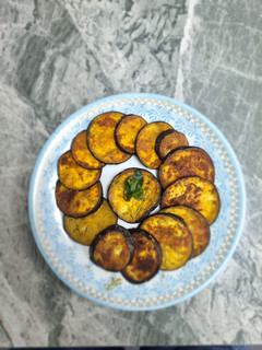 A picture of Aubergine pan fry (Baingan Tawa fry).