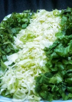 A picture of Lettuce and cabbage salad.