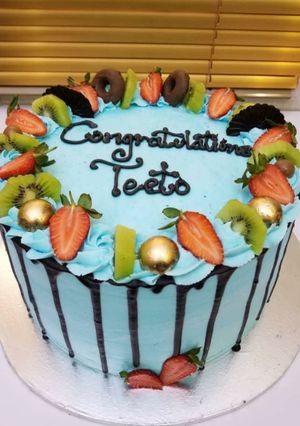 A picture of Chocolate cake with strewberry toppings.