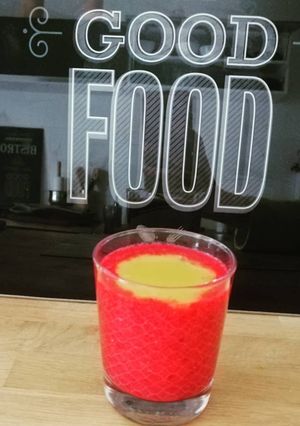 Une photo de Smoothie complet mangue framboise