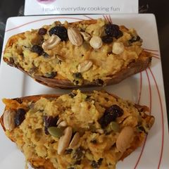 A picture of My Chic pea, and black bean Stuffed Sweet Potato. 😁.