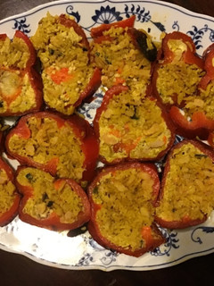 A picture of California Farm Stuffed Sweet Red Peppers with shrimp and fried rice.
