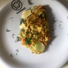 A picture of Cheese omelet with vegetables.