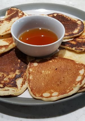 A picture of Scotch Pancakes with Warm Maple Syrup.