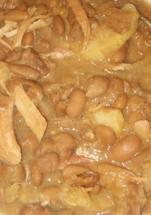 A picture of Brown beans and tenderloin roast.