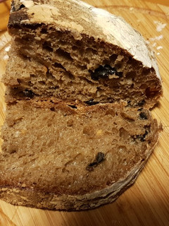A picture of No-Knead Bread - Multigrain Black Olive Country Bread.