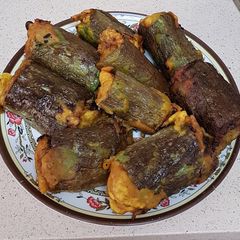 A picture of Stuffed snake gourd.