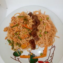 A picture of Egg scrambled spaghetti.