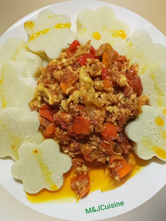 A picture of Boiled yam and egg sauce.