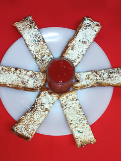 A picture of Cheese spread toast bread fingers.
