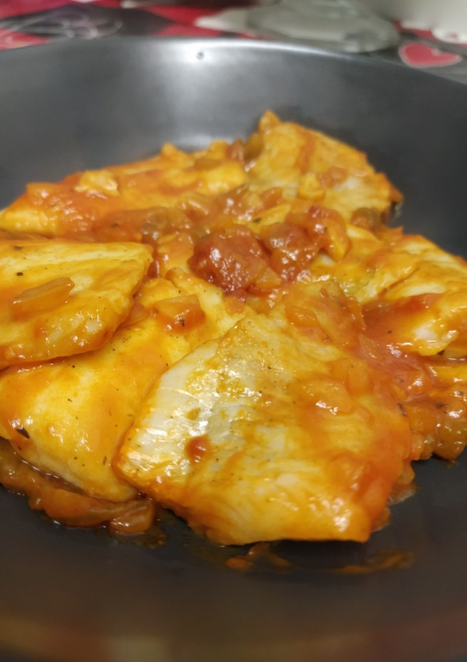 Una foto de 🐟 Merluza con tomate