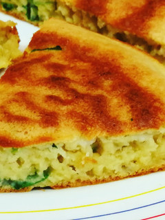 Una foto de Pan Naan con ajo tierno
