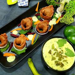Smoky Paneer Bites With Cheesy Minti Capsicum Dip A picture of Smoky Paneer Bites With Cheesy Minti Capsicum Dip.