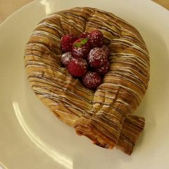 A picture of Apple and raspberry strudel.
