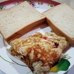 A picture of Buttered Bread with Fried Eggd.