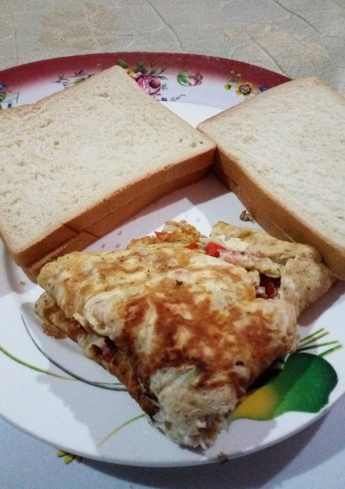 A picture of Buttered Bread with Fried Eggd.