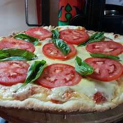 Una foto de Pizza a la piedra