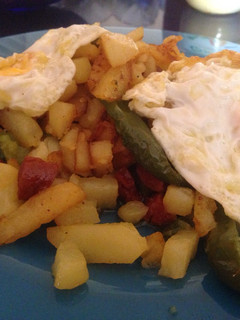 Una foto de Patatas con pimientos