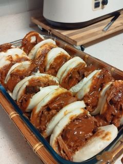 Una foto de Carrilleras con pan bao
