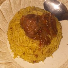 A picture of Jolof n sauce.