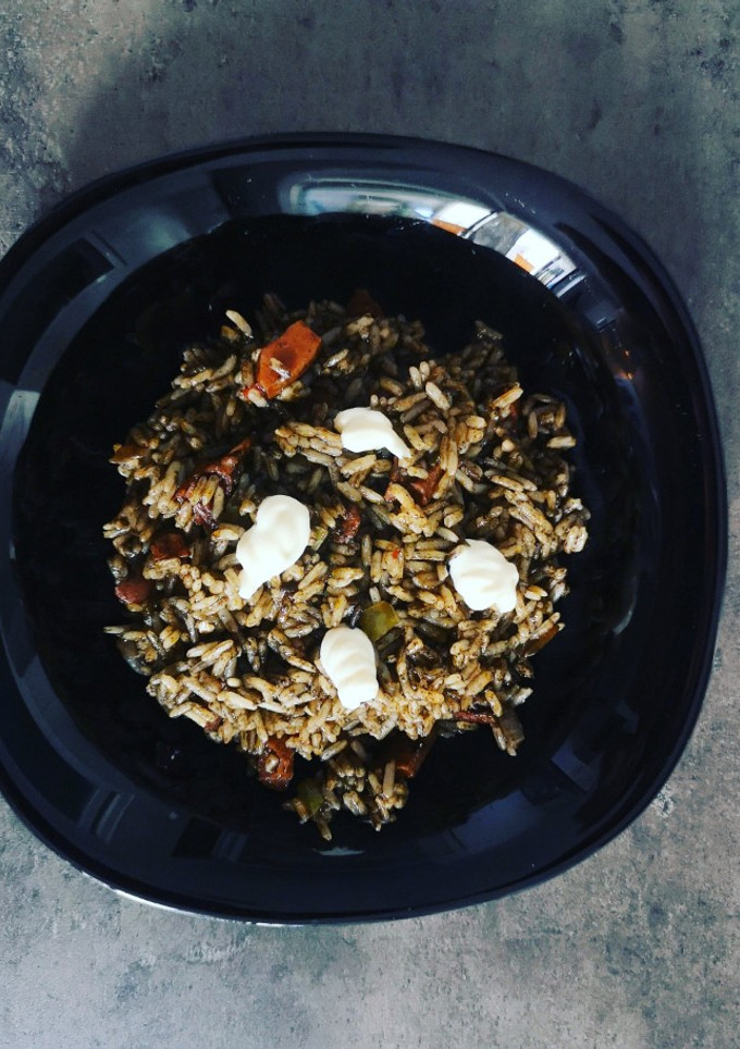 Una foto de Arroz negro express