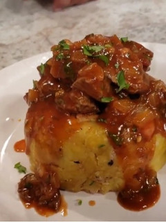 Una foto de Mofongo Relleno de churrasco al estilo de PUERTO RICO