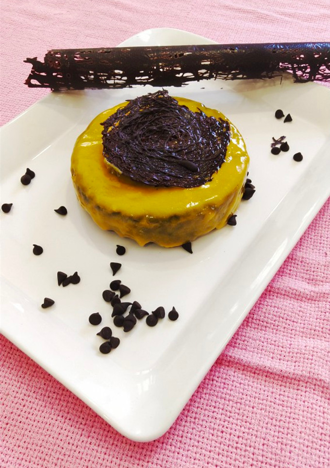 A picture of Cookie cake with mango glaze.