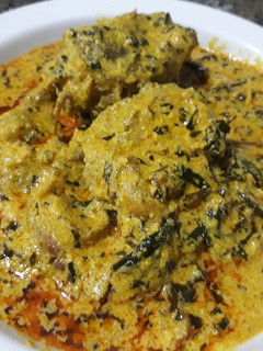 A picture of Egusi soup with bitter leaves.