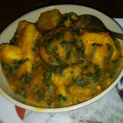 A picture of Porriage yam with vegetable.