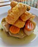 Menestra en escabeche con tacos de merluza a la romana