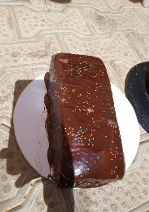 A picture of Chocolate cake loaf with chocolate gnache frosting.