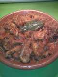 Conejo de monte con tomate, frita de conejo