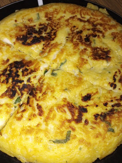 Una foto de Tortilla de cebolla y papas