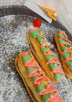 A picture of Chocolate caramel truffle eclairs.
