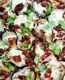 Pizza integral de berenjenas y tomates secos