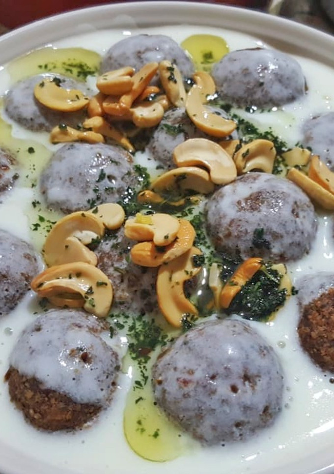 A picture of Kibbeh in Yogurt Sauce.