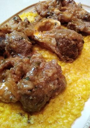 A picture of Classic Risotto alla Milanese with Ossobuco.